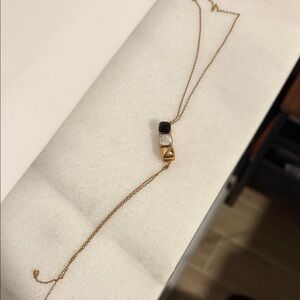 Elegant Gold and Black Necklace